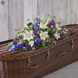 Blue and white casket spray